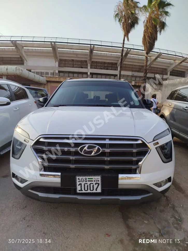 Hyundai  creta  2023  Automatic  36,300 km  4 Cylinder  4WD  SUV  White  Gasoline