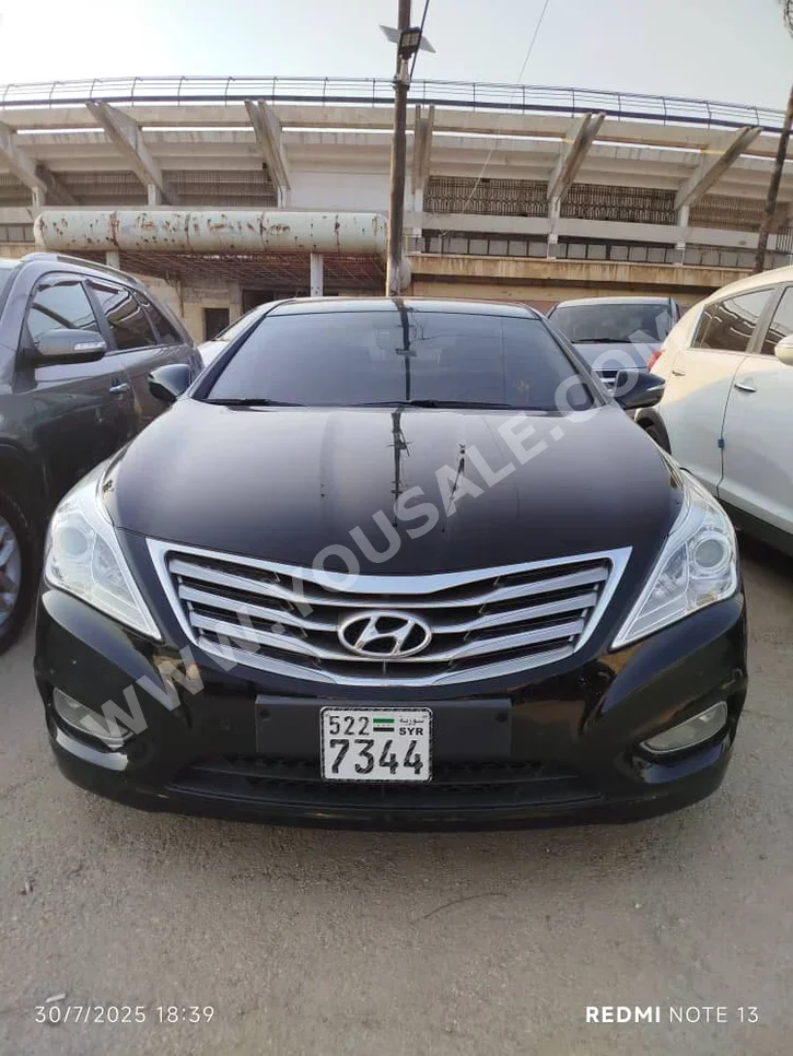 هيونداي  غراندير  2012  اتوماتيك  140,000 كم  6 سلندر  دفع أمامي  سيدان  أسود  بنزين