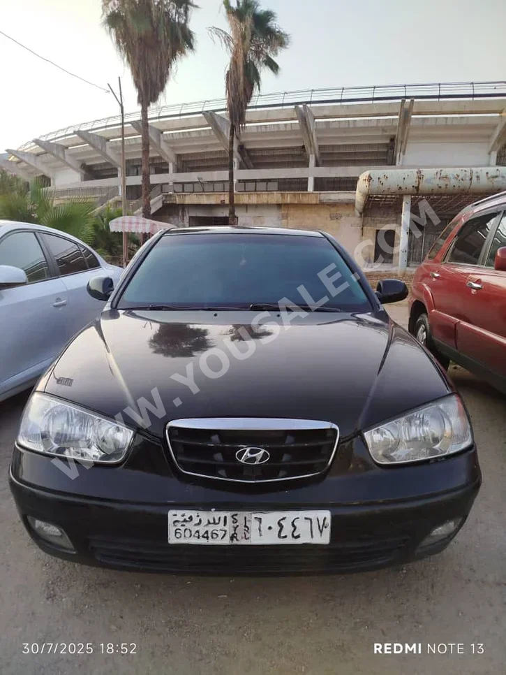 هيونداي  النترا  2005  اتوماتيك  352,157 كم  4 سلندر  دفع أمامي  سيدان  أسود  بنزين