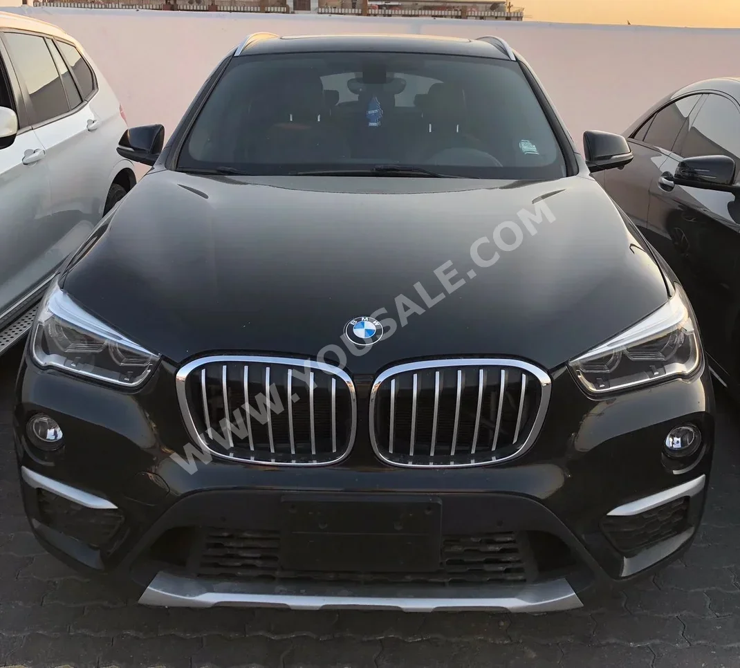 BMW  X-Series  1  2016  Automatic  120,000 km  4 Cylinder  4WD  SUV  Brown  Gasoline