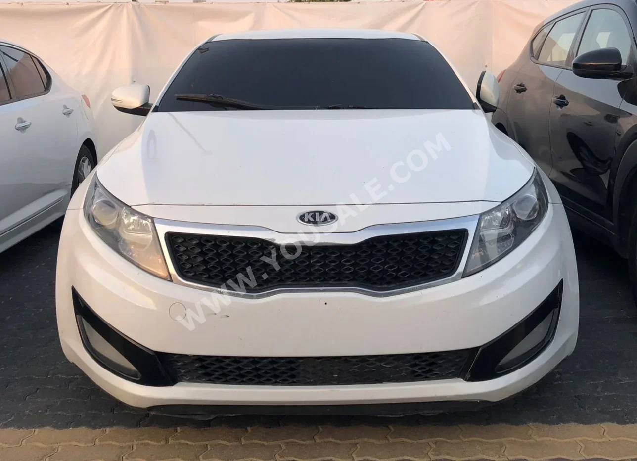 Kia  Optima  2011  Automatic  127,000 km  4 Cylinder  FWD  Sedan  White  Gasoline