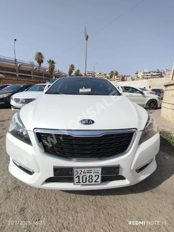 Kia  K7  2012  Automatic  150,000 km  4 Cylinder  FWD  Sedan  White  Gasoline