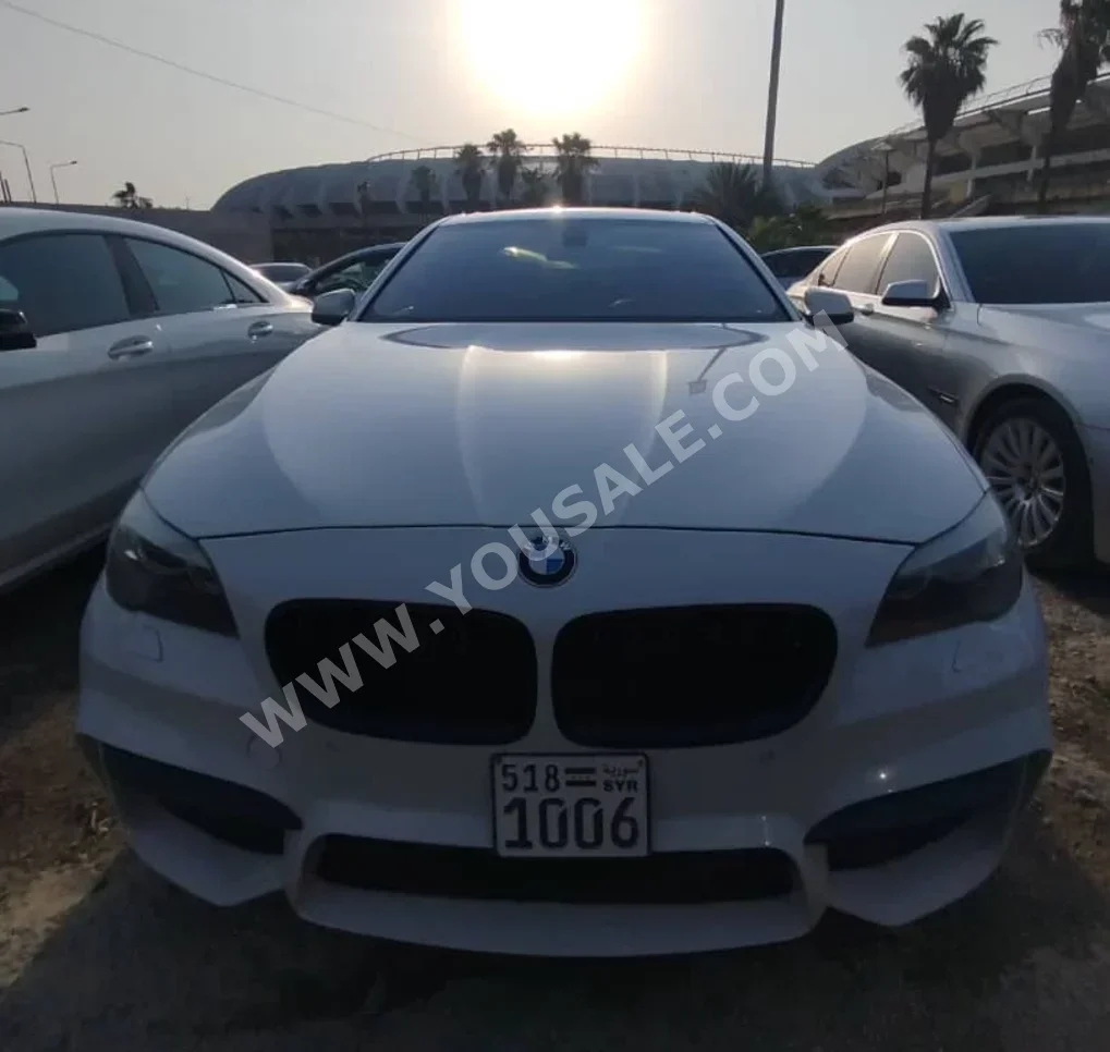 BMW  5-Series  535i  2012  Automatic  240,000 km  6 Cylinder  RWD  Sedan  White  Gasoline