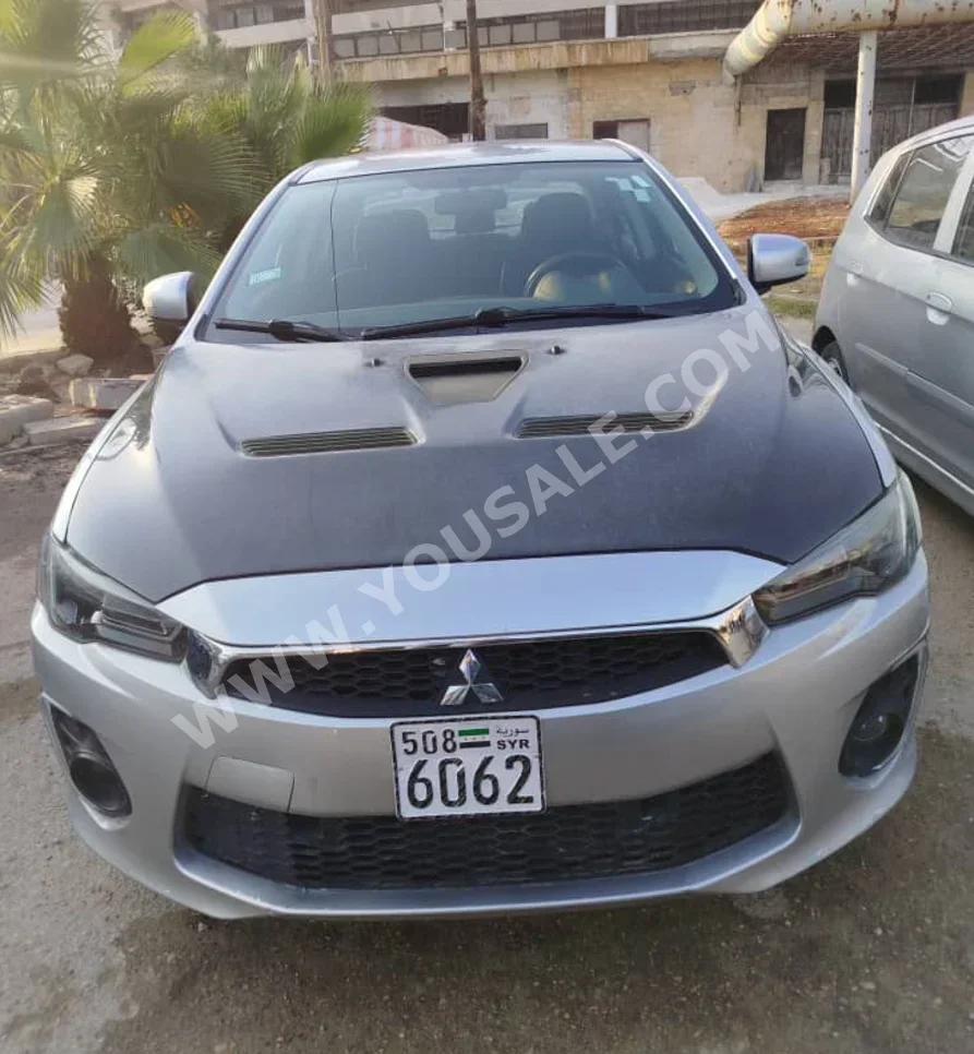 Mitsubishi Lancer 2018 Automatic 120,644 km 4 Cylinder FWD Sedan Silver Gasoline