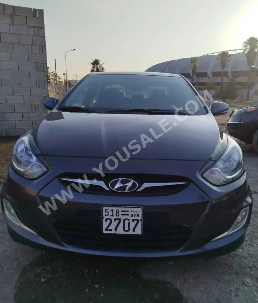 Hyundai  Accent  2012  Automatic  120,000 km  4 Cylinder  FWD  Sedan  Dark Gray  Gasoline