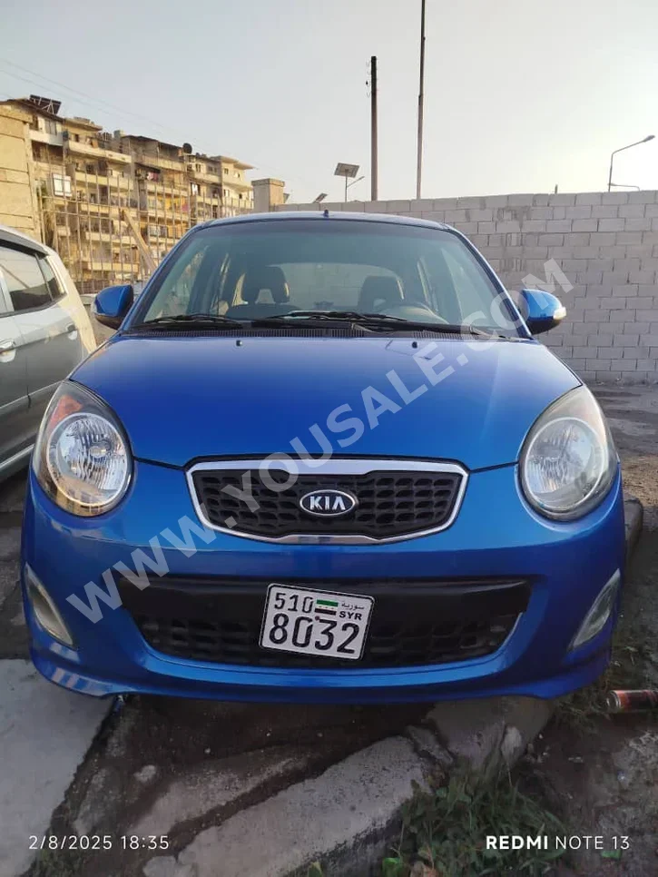 كيا بكانتو 2008 اتوماتيك 150,000 كم 3 سلندر دفع أمامي هاتشباك ازرق بنزين