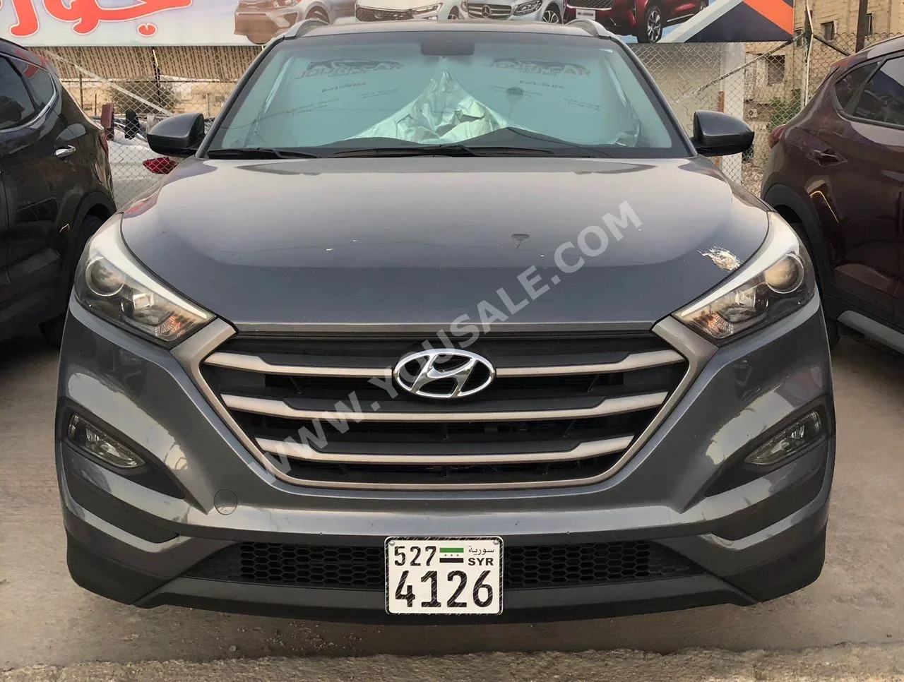 هيونداي توسان 2018 اتوماتيك 129,000 كم 4 سلندر دفع رباعي اس يو في رمادي بنزين