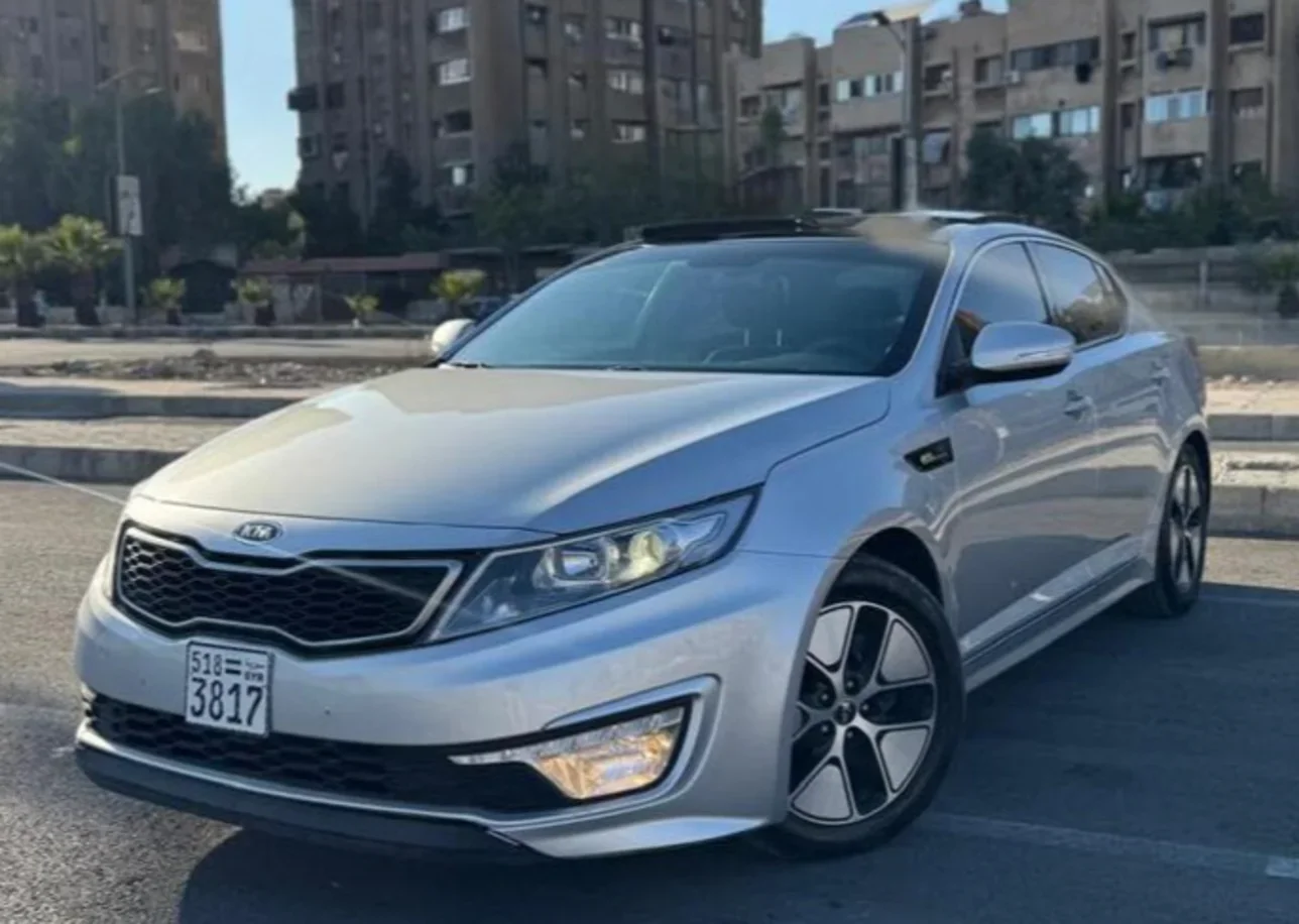 Kia  K5  2012  Automatic  133,000 km  4 Cylinder  FWD  Sedan  Silver  Hybrid
