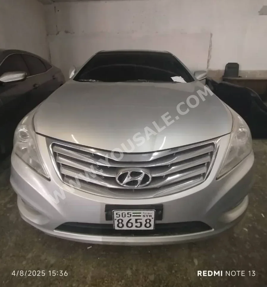 Hyundai  Azera  2012  Automatic  155,000 km  4 Cylinder  FWD  Sedan  Silver  Gasoline