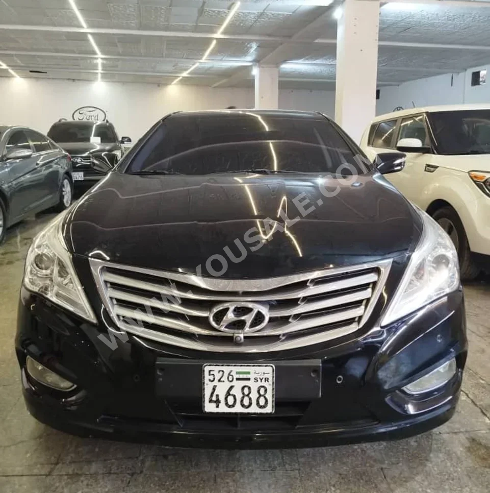 Hyundai  Grandeur  2013  Automatic  121,000 km  6 Cylinder  FWD  Sedan  Black  Gasoline