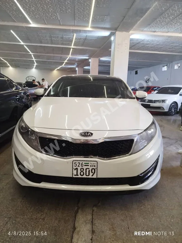 Kia  K5  2012  Automatic  127,000 km  4 Cylinder  FWD  Sedan  White  Gasoline