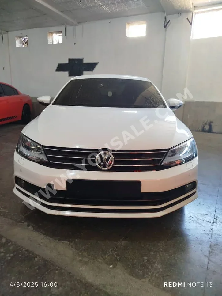 Volkswagen  Jetta  2015  Automatic  130,000 km  4 Cylinder  FWD  Sedan  White  Diesel