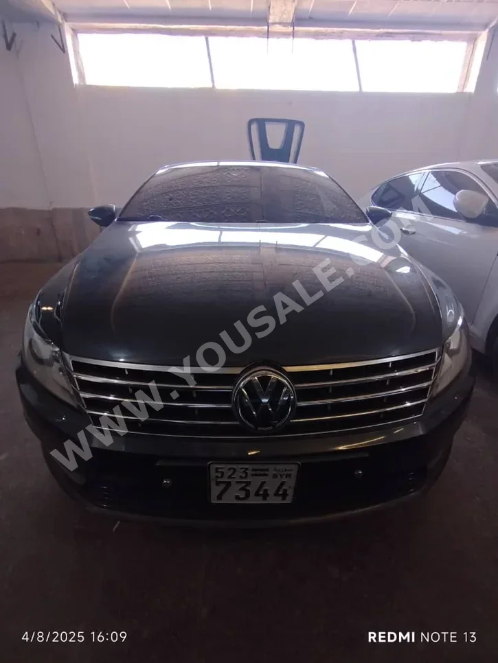 Volkswagen  Passat  CC  2014  Automatic  350,000 km  4 Cylinder  FWD  Sedan  Dark Gray  Diesel
