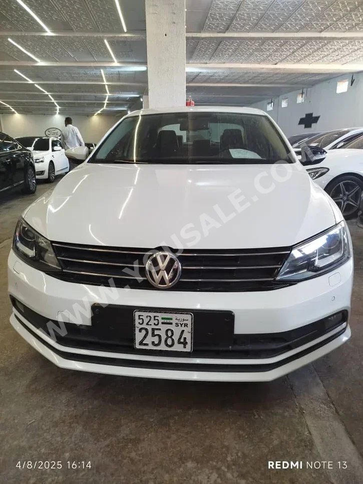 Volkswagen  Jetta  2015  Automatic  260,000 km  4 Cylinder  FWD  Sedan  White  Diesel