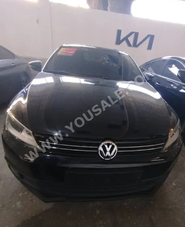 Volkswagen  Jetta  2015  Automatic  90,000 km  4 Cylinder  FWD  Sedan  Black  Diesel
