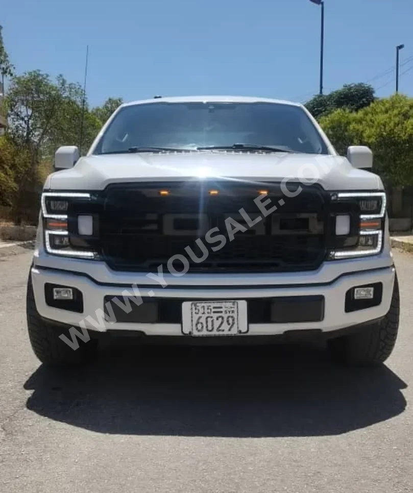 Ford  F  150  2019  Automatic  165,000 km  6 Cylinder  RWD  Pick Up  White  Gasoline