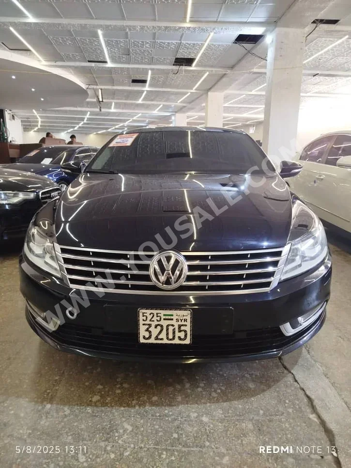 Volkswagen  Passat  CC  2015  Automatic  200,000 km  4 Cylinder  FWD  Sedan  Black  Diesel