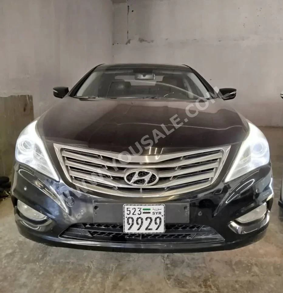 Hyundai  Grandeur  2012  Automatic  180,000 km  4 Cylinder  FWD  Sedan  Black  Gasoline