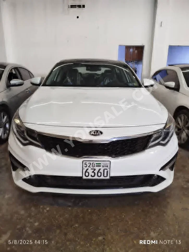 Kia  Optima  2019  Automatic  130,000 km  4 Cylinder  FWD  Sedan  White  Gasoline