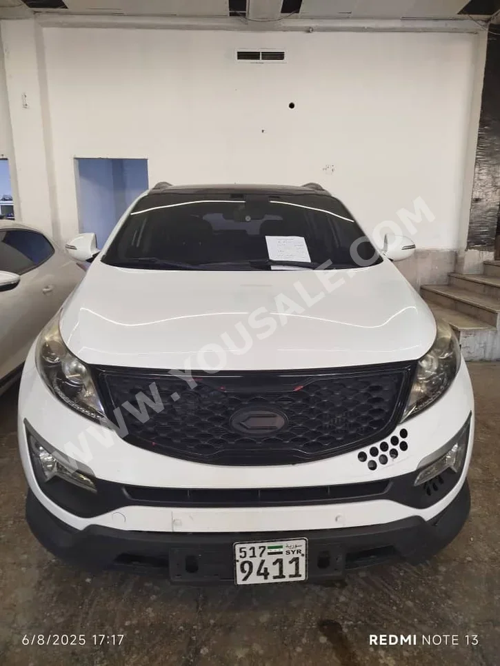 Kia  Sportage  2014  Automatic  180,000 km  4 Cylinder  FWD  SUV  White  Diesel