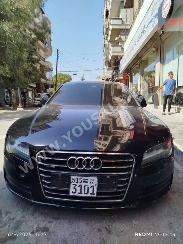 Audi  A7  2013  Automatic  292,639 km  4 Cylinder  FWD  Sedan  Black  Diesel