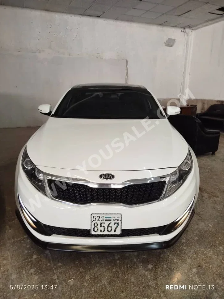 Kia  K5  2011  Automatic  196,000 km  4 Cylinder  FWD  Sedan  White  Gasoline