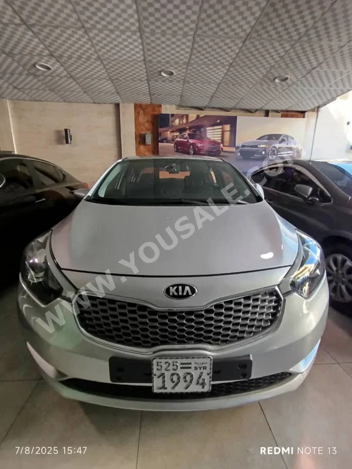 Kia  K3  2013  Automatic  64,000 km  4 Cylinder  FWD  Sedan  Silver  Gasoline