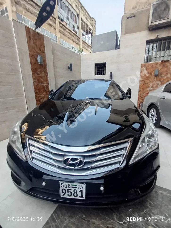 هيونداي  غراندير  2013  اتوماتيك  180,000 كم  6 سلندر  دفع أمامي  سيدان  أسود  بنزين