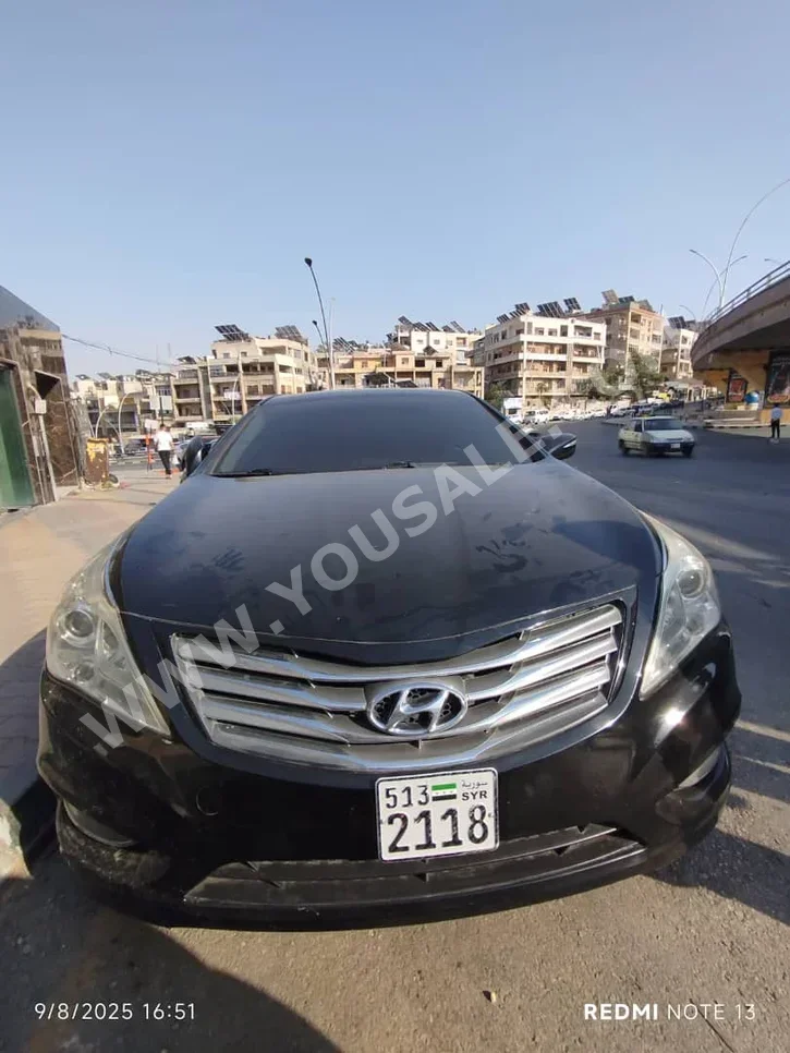 Hyundai  Azera  2012  Automatic  240,000 km  6 Cylinder  FWD  Sedan  Black  Gasoline