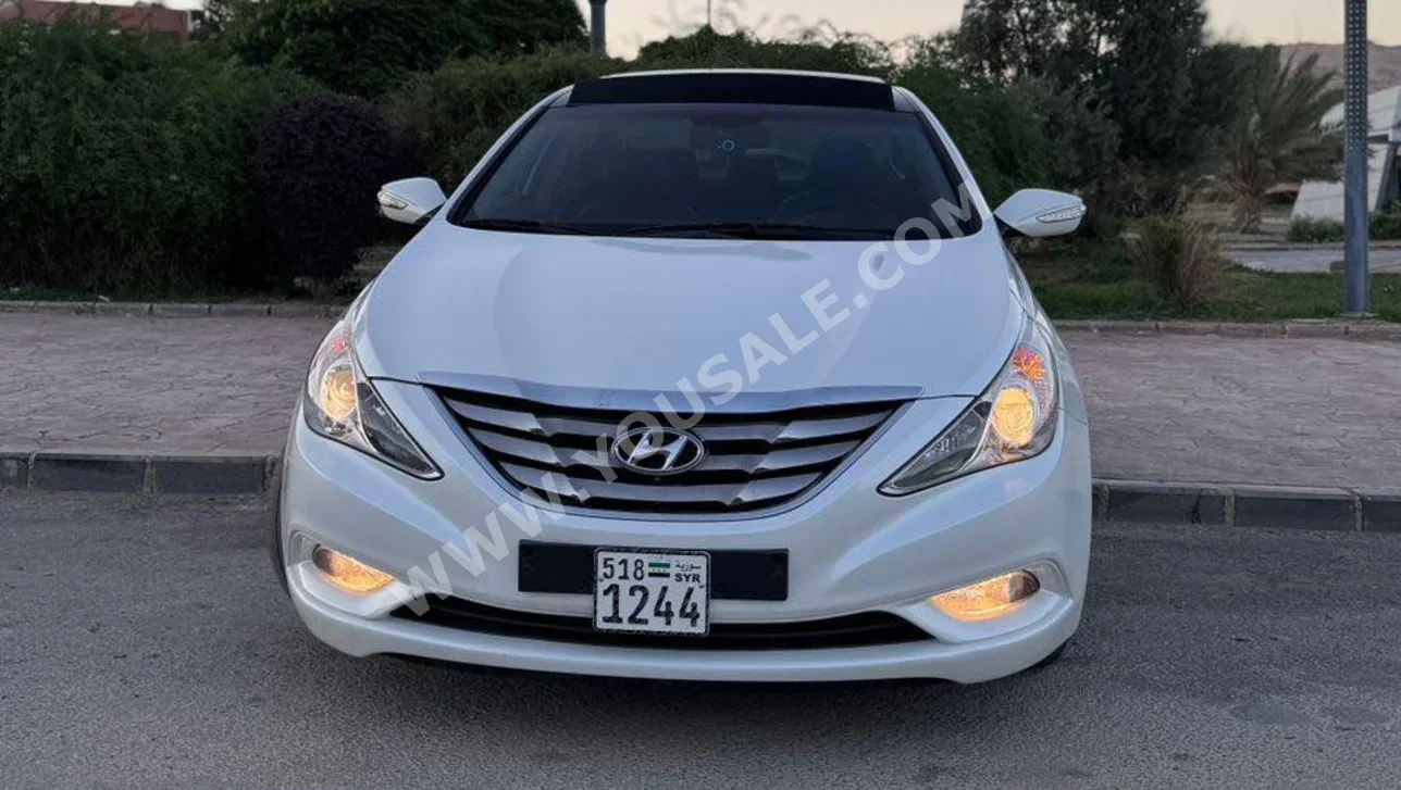 Hyundai  Sonata  2011  Automatic  69,000 km  4 Cylinder  FWD  Sedan  White  Gasoline