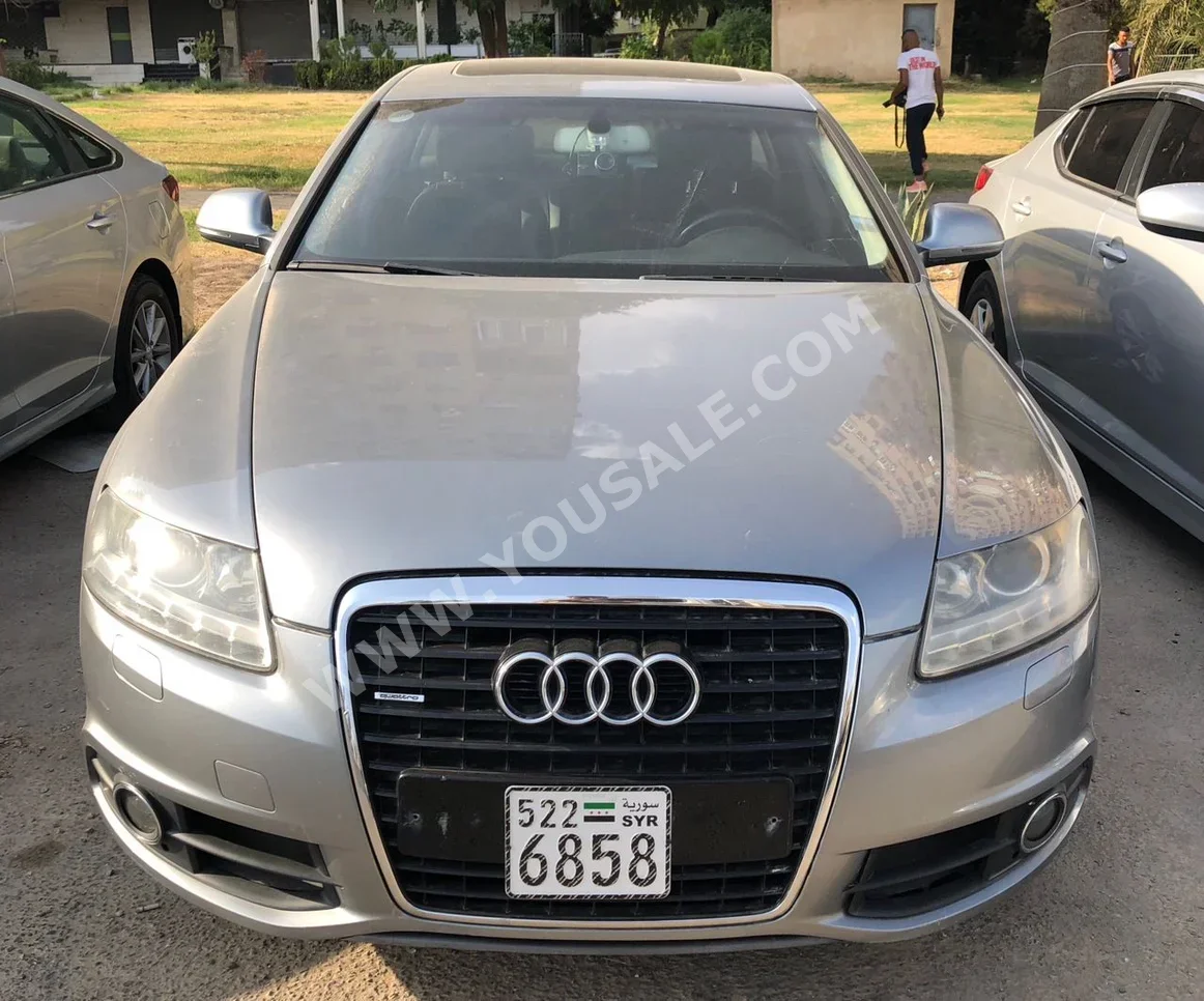 Audi  A6  2012  Automatic  178,000 km  4 Cylinder  RWD  Sedan  Gray  Gasoline