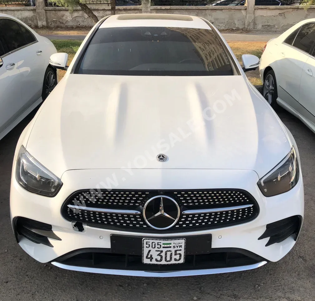 Mercedes-Benz  E-Class  300  2023  Automatic  12,000 km  6 Cylinder  4WD  Sedan  White  Gasoline
