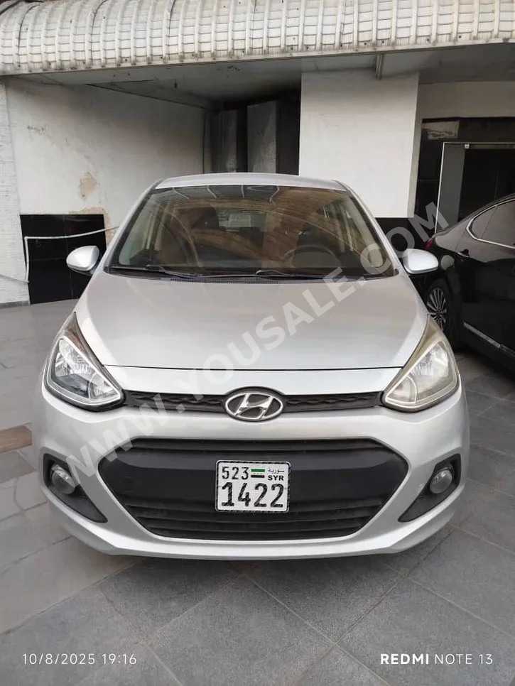 Hyundai  I  10  2015  Manual  112,000 km  4 Cylinder  FWD  Hatchback  Silver  Gasoline
