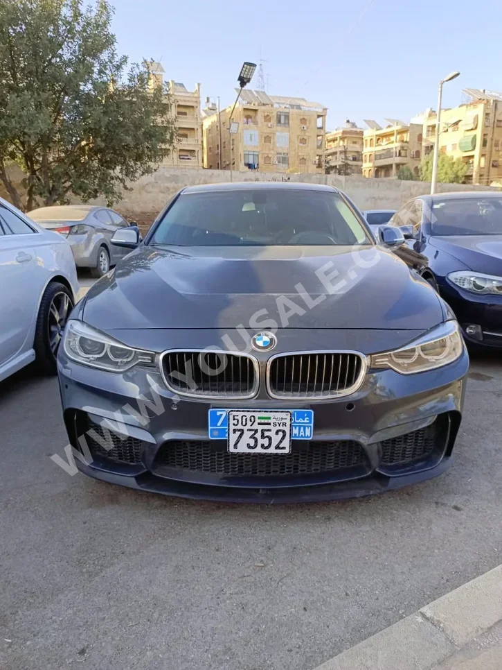 BMW  3-Series  320i  2017  Automatic  190,000 km  4 Cylinder  RWD  Sedan  Dark Gray  Gasoline