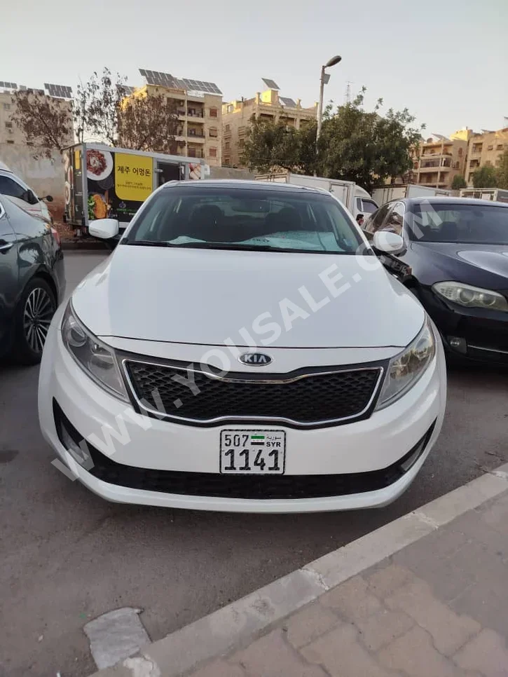 Kia  Optima  2013  Automatic  95,000 km  4 Cylinder  FWD  Sedan  White  Hybrid