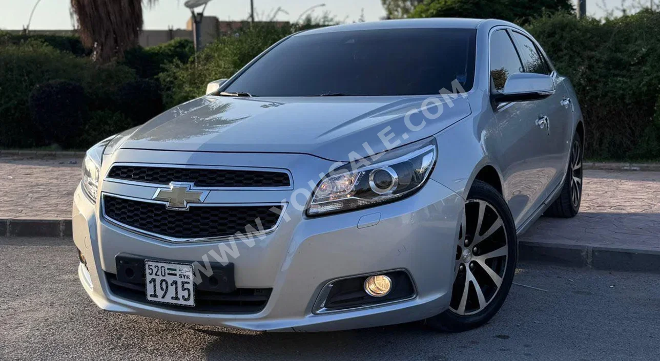 Chevrolet  Malibu  2013  Automatic  142,000 km  4 Cylinder  FWD  Sedan  Silver  Gasoline
