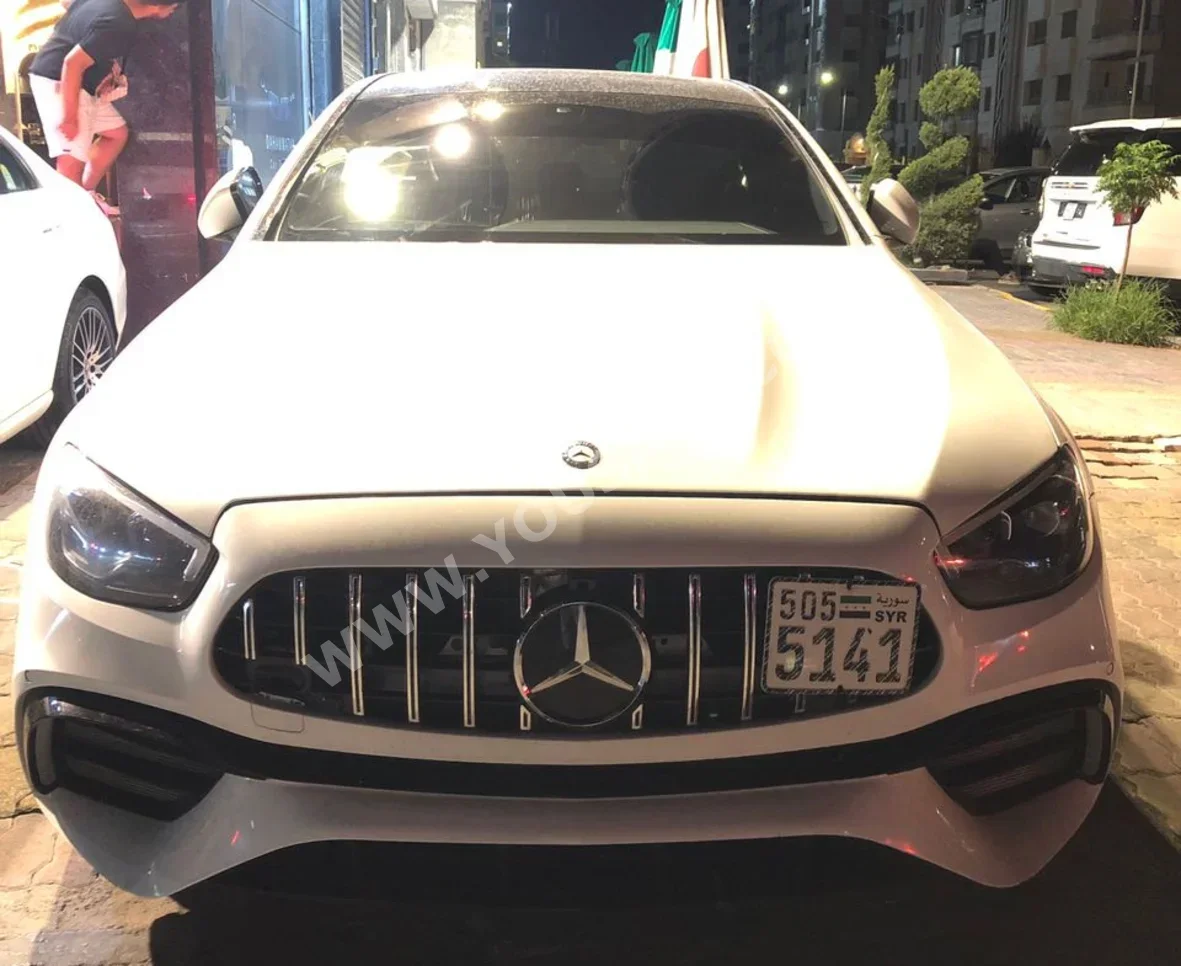 Mercedes-Benz  E-Class  300  2017  Automatic  72,000 km  4 Cylinder  RWD  Sedan  White  Gasoline