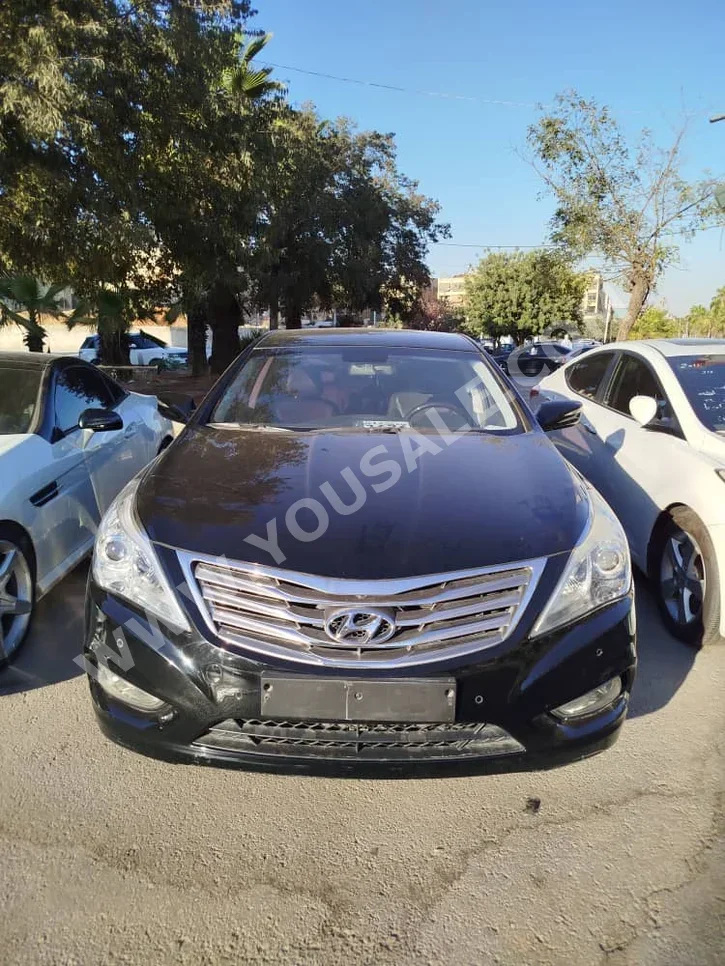 Hyundai  Grandeur  2012  Automatic  154,000 km  4 Cylinder  FWD  Sedan  Black  Gasoline