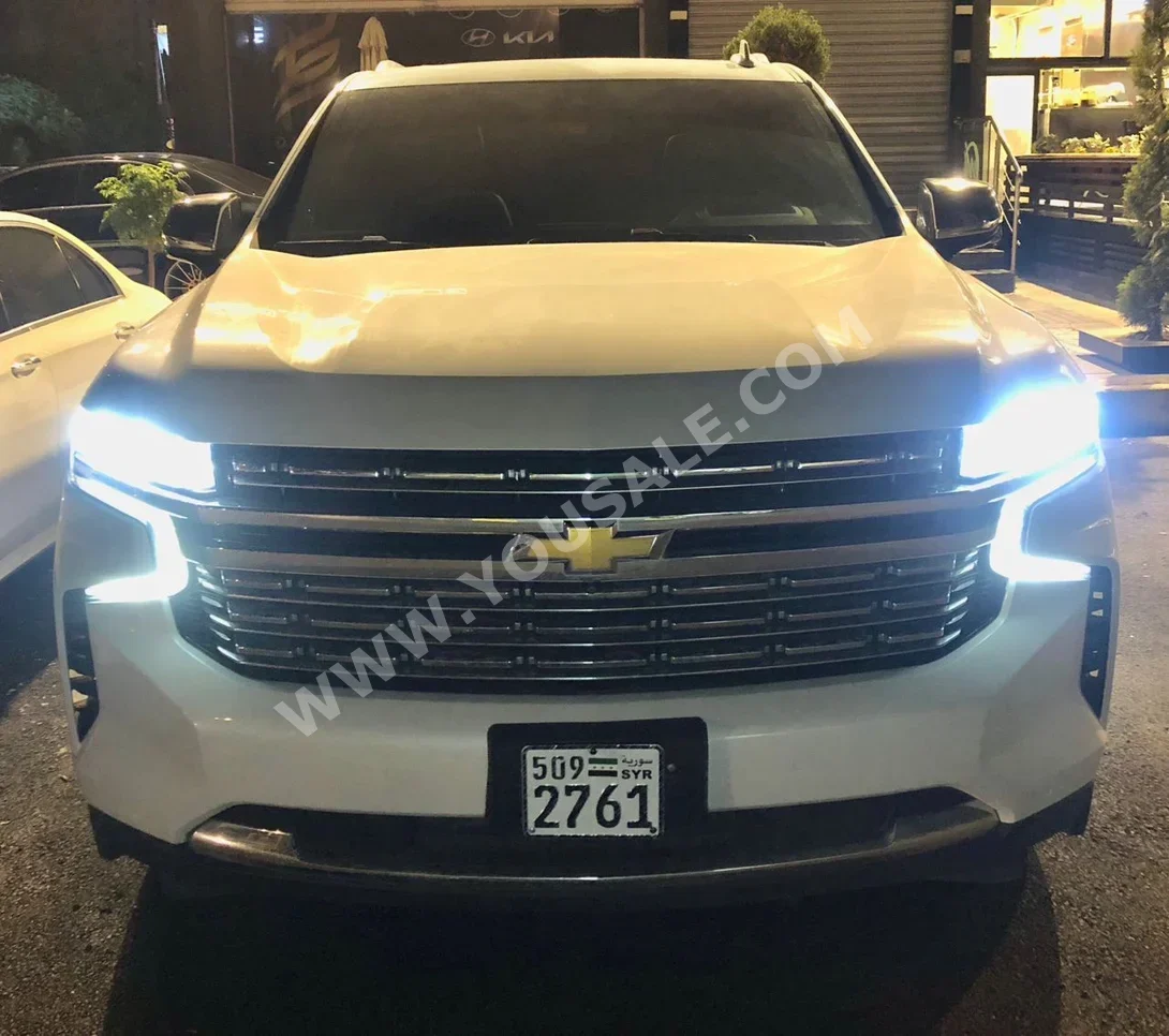 شفروليه تاهو 2021 اتوماتيك 130,000 كم 8 سلندر دفع رباعي اس يو في أبيض بنزين