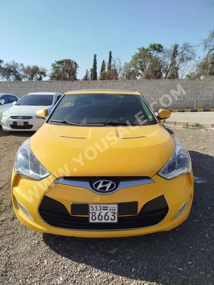 Hyundai  Veloster  2012  Automatic  180,000 km  4 Cylinder  FWD  Hatchback  Yellow  Gasoline