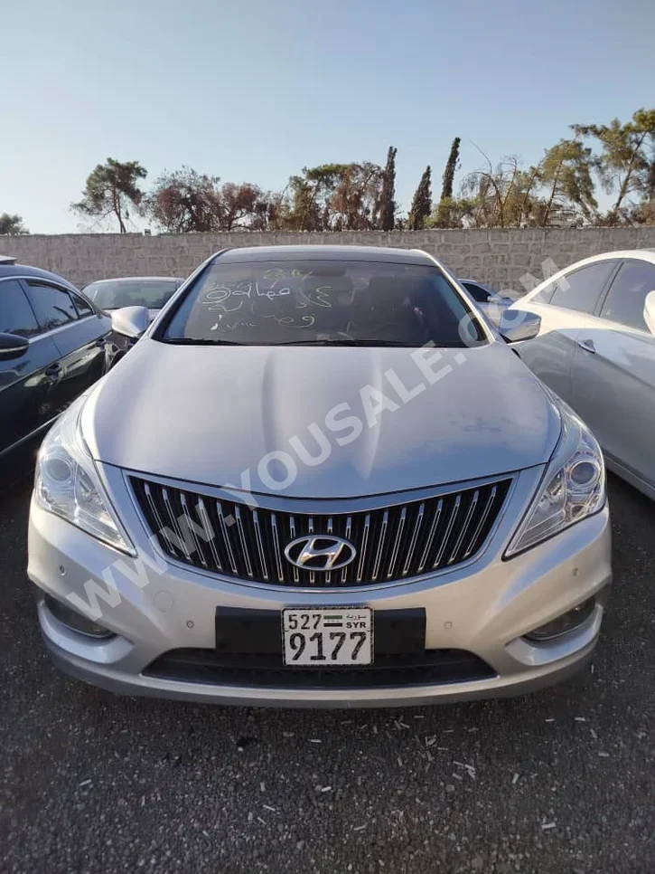 Hyundai Grandeur 2014 Automatic 179,597 km 6 Cylinder FWD Sedan Silver Gasoline