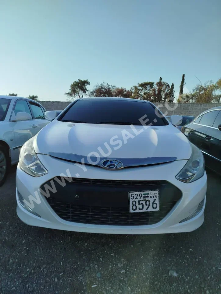 Hyundai Sonata 2014 Automatic 86,700 km 4 Cylinder FWD Sedan White Hybrid