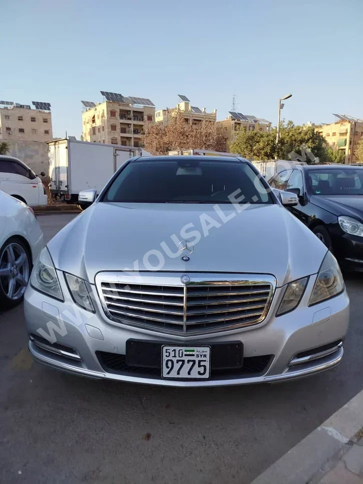 Mercedes-Benz  E-Class  300  2012  Automatic  170,000 km  6 Cylinder  RWD  Sedan  Silver  Gasoline