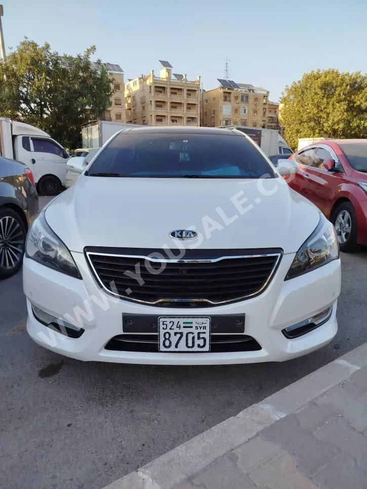 Kia  K7  2012  Automatic  115,000 km  6 Cylinder  FWD  Sedan  White  Gasoline