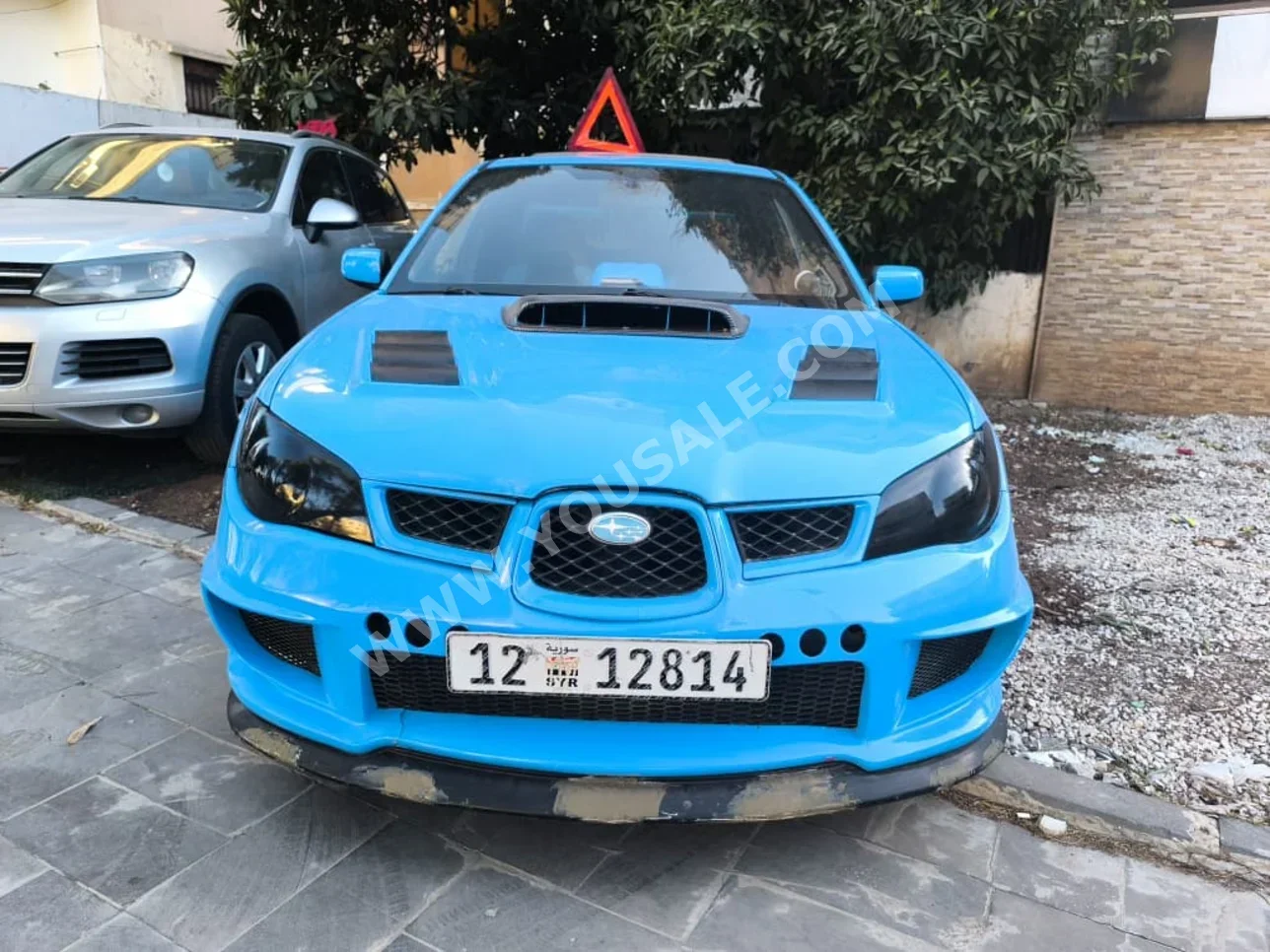 Subaru  Impreza  2006  Manual  170,000 km  4 Cylinder  RWD  Coupe / Sport  Blue  Gasoline