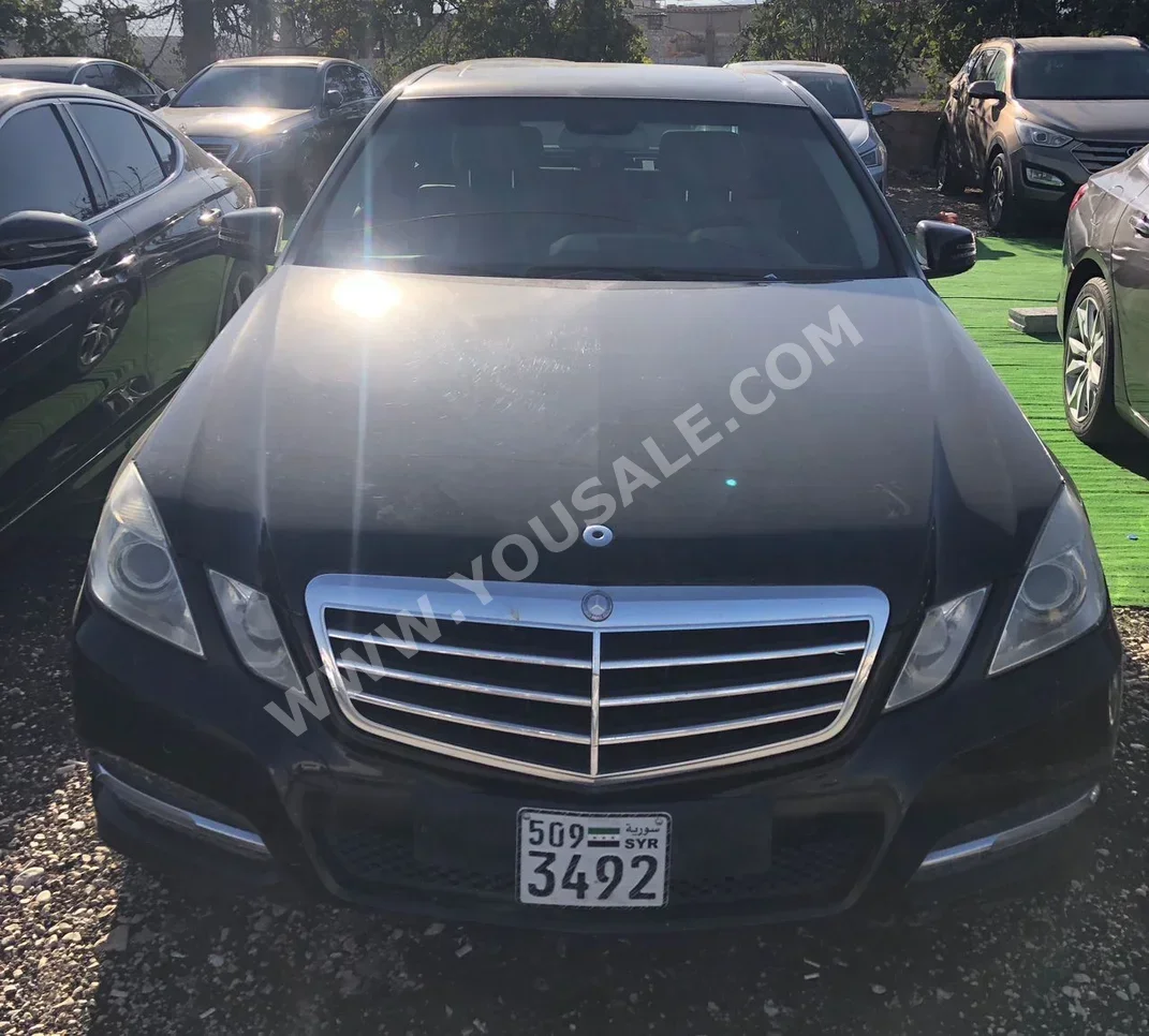 Mercedes-Benz  E-Class  250  2011  Automatic  140,000 km  6 Cylinder  RWD  Sedan  Black  Gasoline