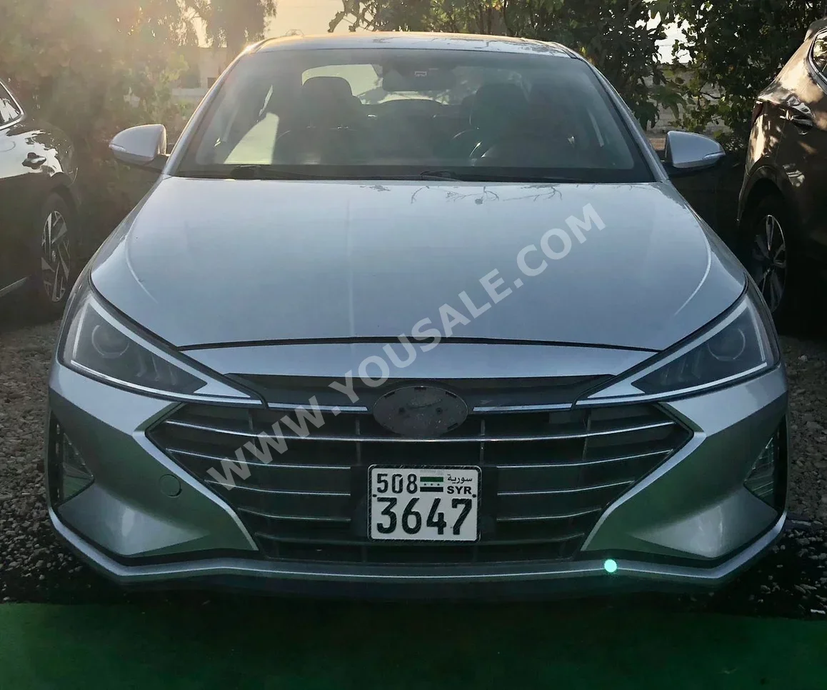 Hyundai  Elantra  2019  Automatic  100,000 km  4 Cylinder  FWD  Sedan  Silver  Gasoline