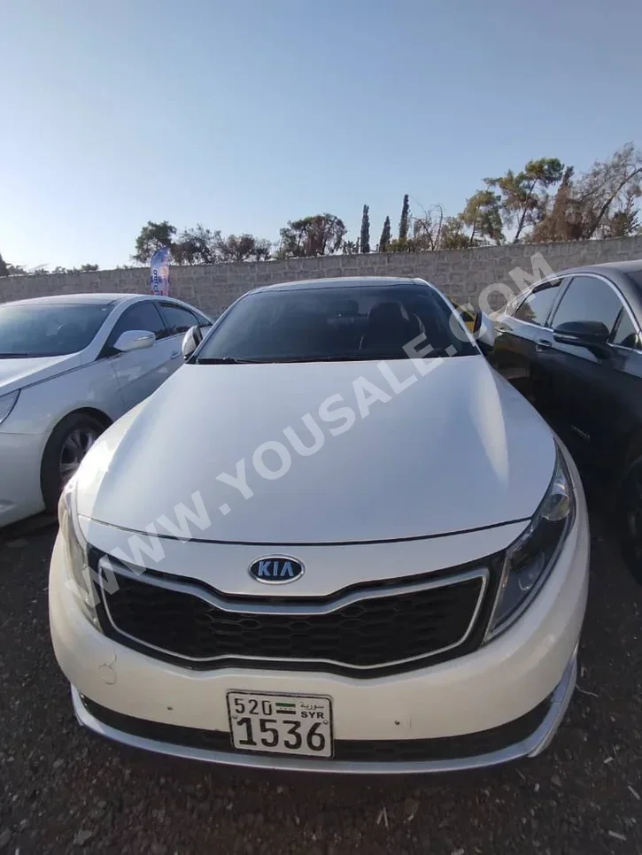 Kia  K5  2012  Automatic  175,423 km  4 Cylinder  FWD  Sedan  White  Hybrid