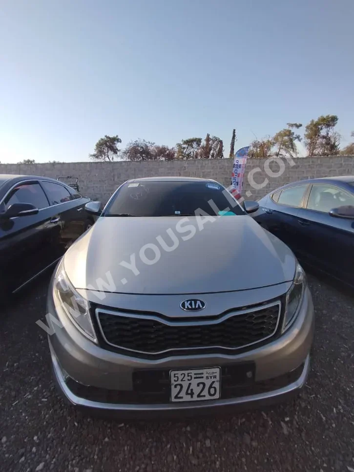 Kia  K5  2014  Automatic  150,750 km  4 Cylinder  FWD  Sedan  Light Gold  Hybrid