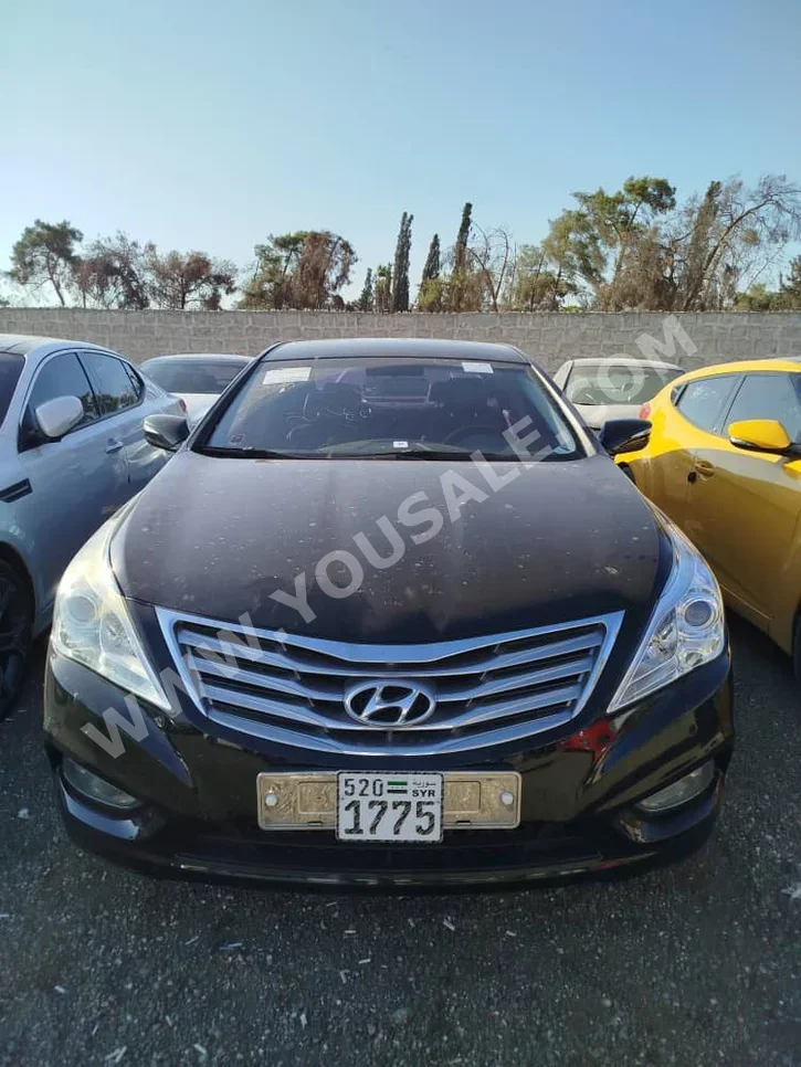 Hyundai  Grandeur  2012  Automatic  180,000 km  4 Cylinder  FWD  Sedan  Black  Gasoline